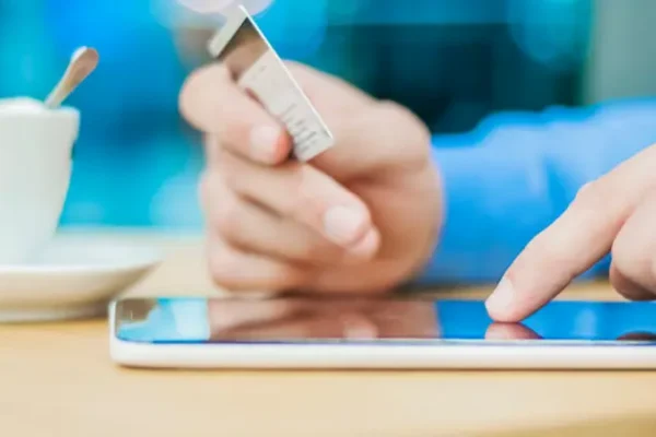 Man using card for online payment